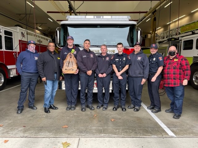 Chima Amajioyi feeds American Canyon Firefighters